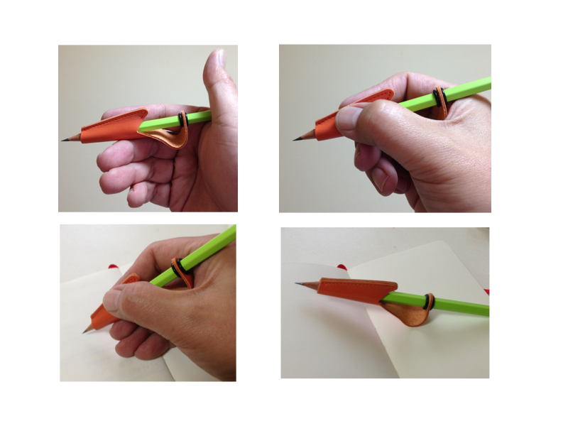 自主開発デザイン・筆記具補助具・ゼロスペック　鉛筆キャップが変形して筆記の際にはグリップとして機能する。